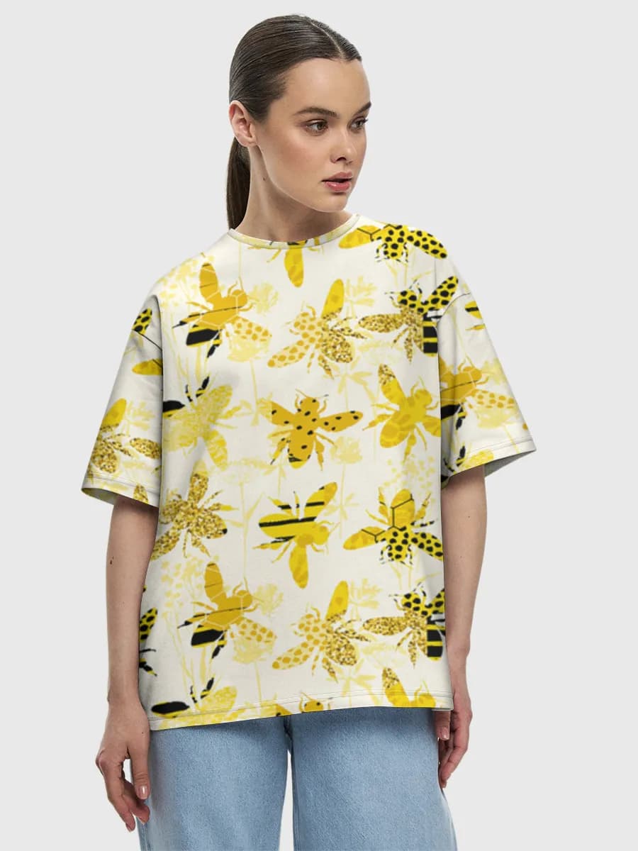 Golden Bee Garden — Women's oversized cotton T-shirt with all-over print, Bees theme