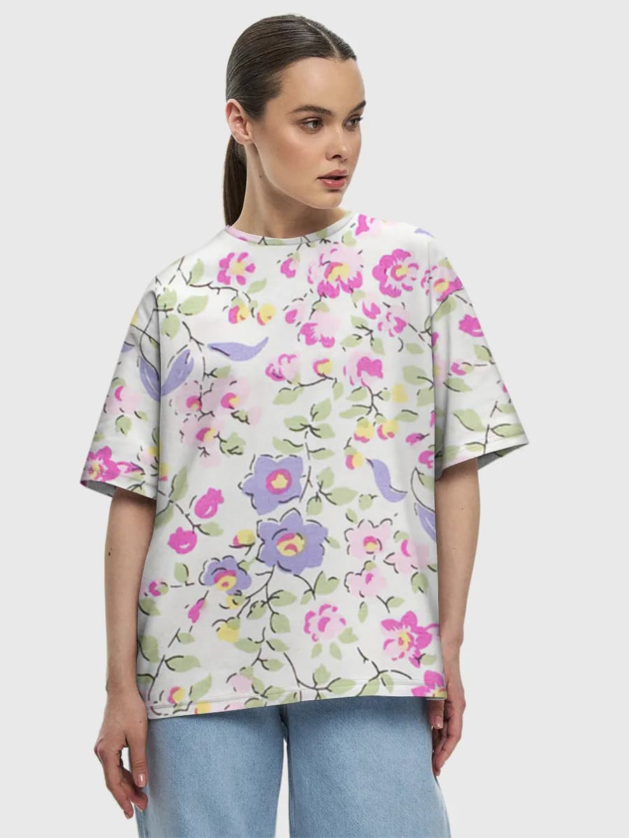 Pastel Wildflower Garden — Women's oversized cotton T-shirt with all-over print, Floral theme