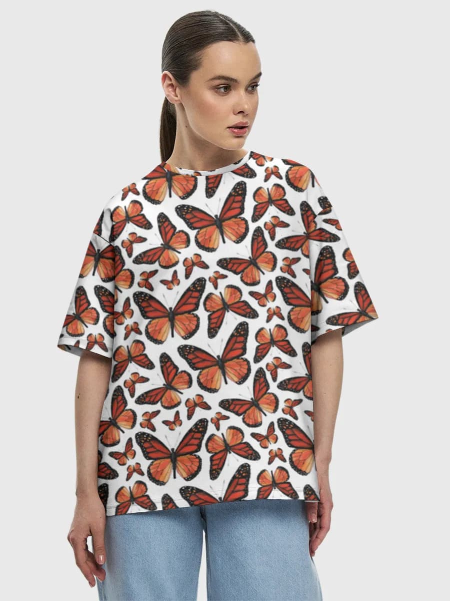 Monarch Butterfly Swarm — Women's oversized cotton T-shirt with all-over print, Butterflies theme
