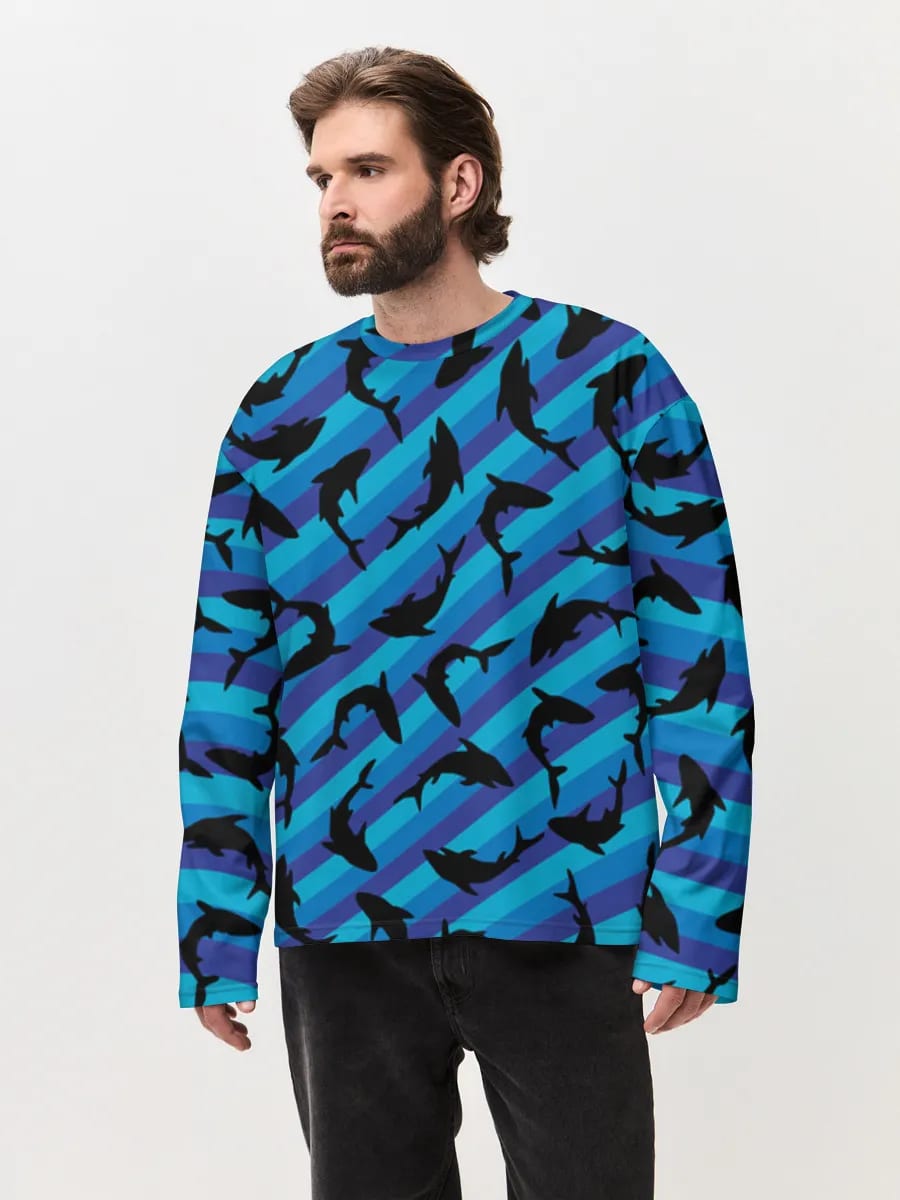 Siluetas de tiburones en azul