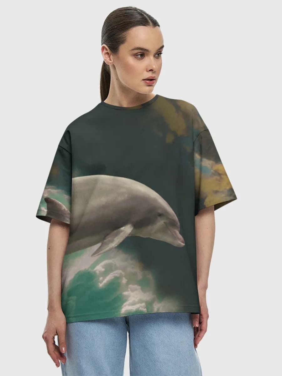 Flying Dolphin Dreamscape — Women's oversized cotton T-shirt with all-over print, Dolphin theme
